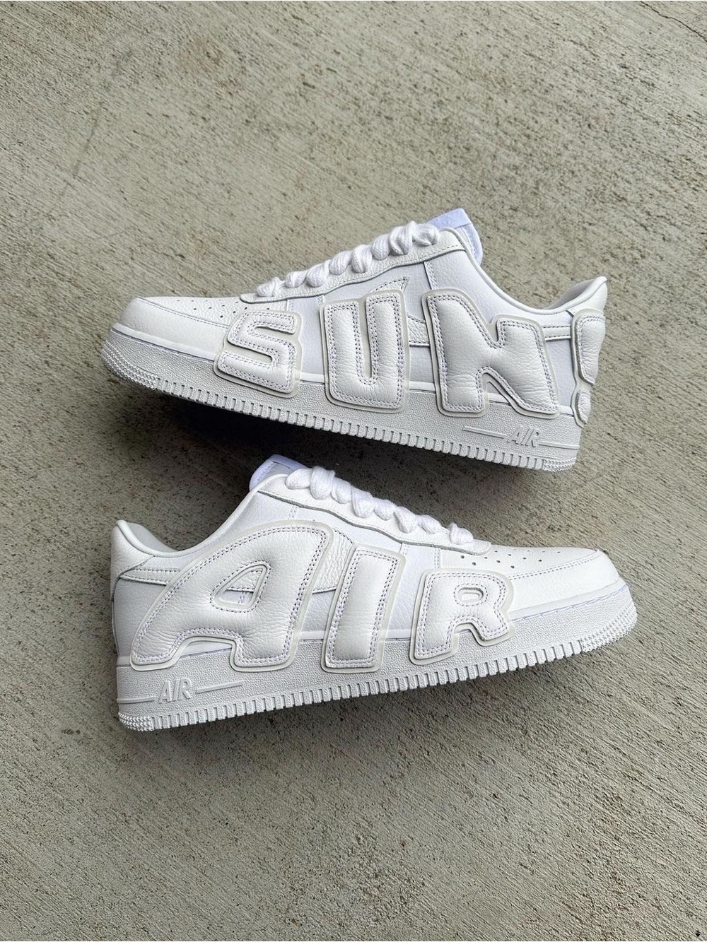Nike White Low-Top AIR Embossed Sneakers
